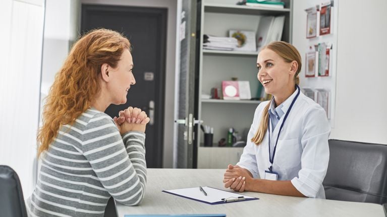 woman meeting with doctor