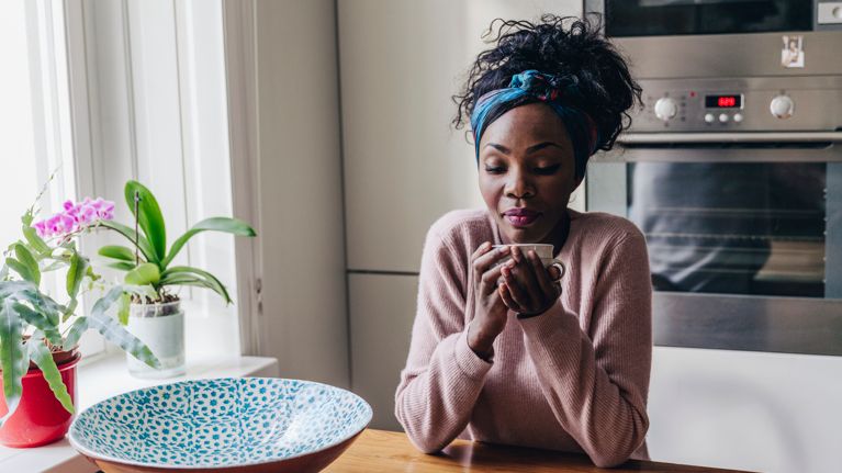 Woman having coffee