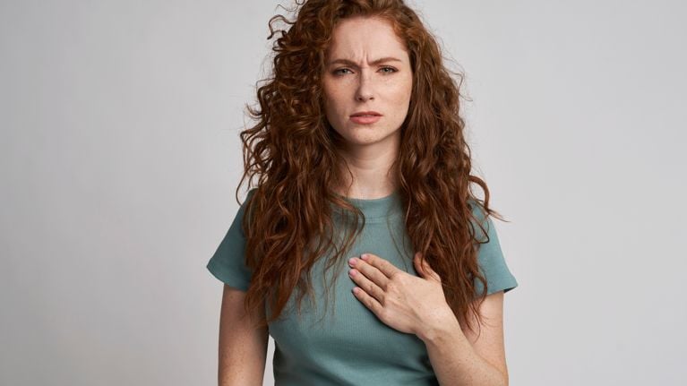 Young woman with pain of chest