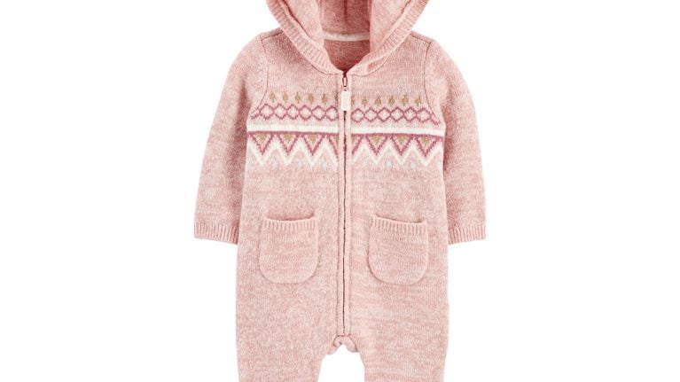 A soft pink full-body jumpsuit for babies.