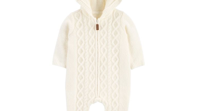 A white full-body jumpsuit for babies.