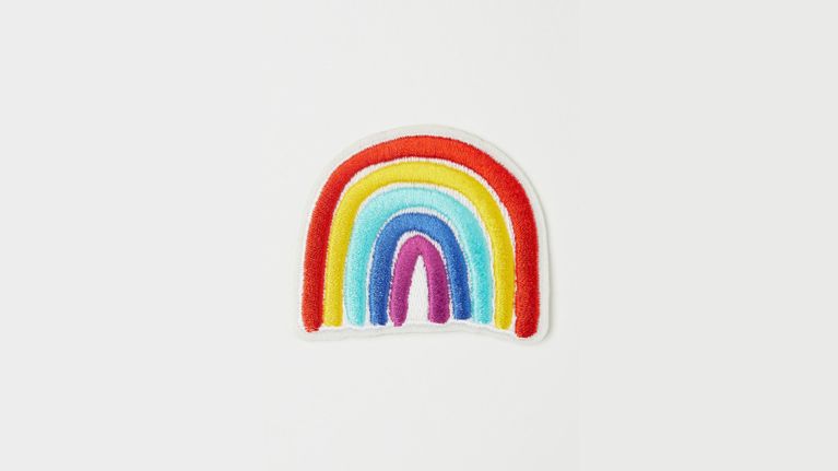 A repair patch for clothing in the shape of a rainbow from H&M