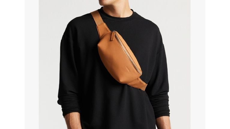 man wearing crossbody bag