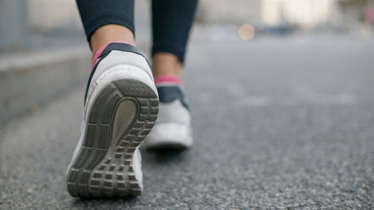 picture of someone's feet walking outside