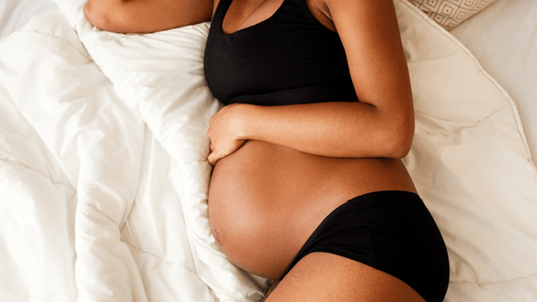 pregnant woman lying down