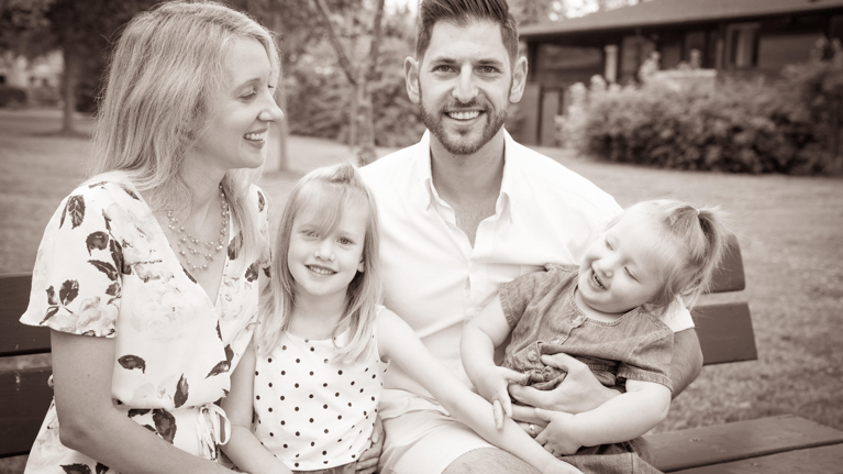 author jacqueline and her her husband and two daughters