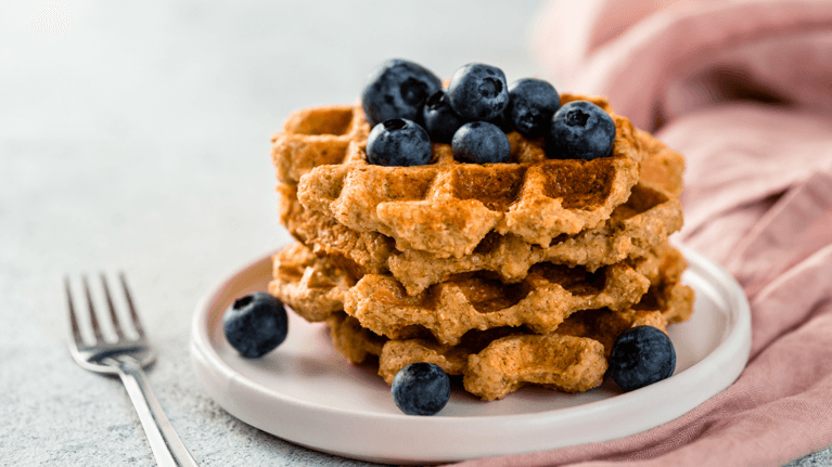 stack of healthy waffles with blueberries on top